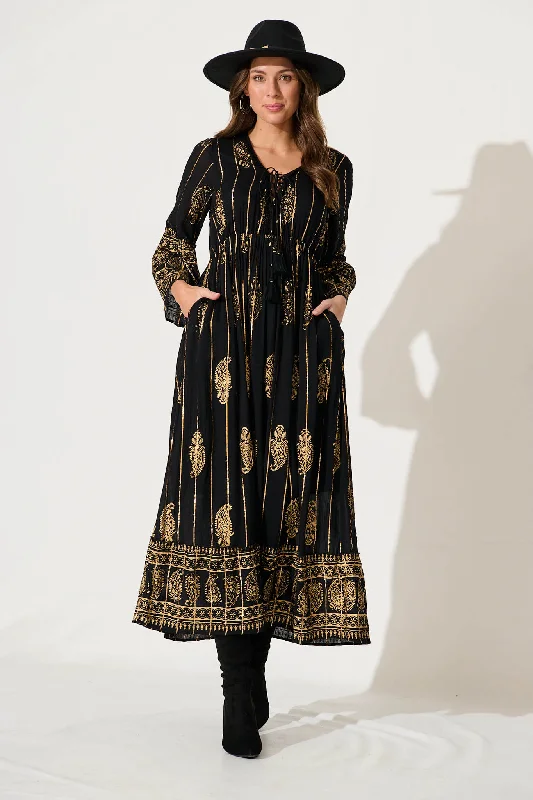 Party Dresses with Metallic Sequined Bodice and Chiffon Skirt and Sheer Back for Ladies' Glamorous and Sexy LookEllie Maxi Dress In Black With Gold Print Party Dresses with Metallic Sequined Bodice and Chiffon Skirt and Sheer Back for Ladies' Glamorous and Sexy LookEllie Maxi Dress In Black With Gold Print
