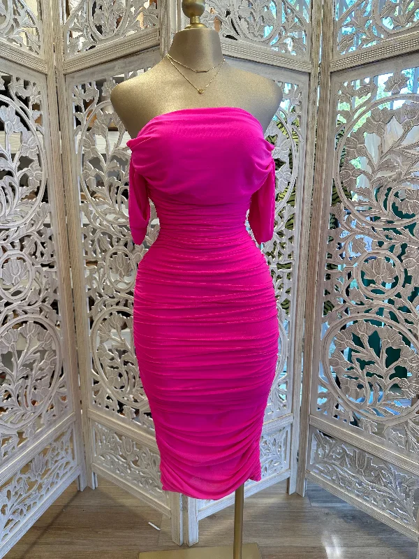 Midi dress for travel due to its versatility and durabilityRuched Pink Midi Dress