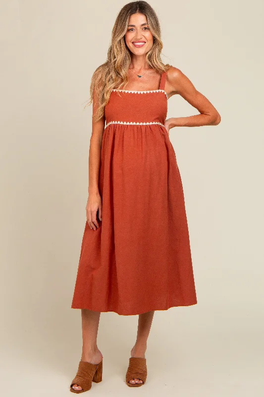 Midi dress for a family gathering in a casual settingRust Contrast Trim Maternity Midi Dress