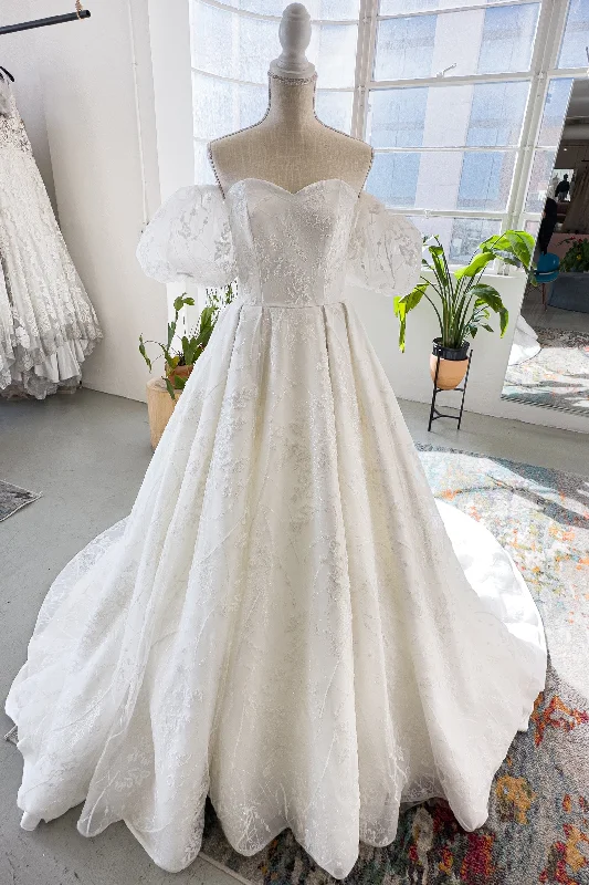 Wedding Dresses with Satin Trimmed Collar and Bow Back and Embroidered Skirt and Sequined Bodice and Belt and Embroidered Floral Patterns for a Classic and Glamorous LookA-Line Chapel Train Lace Tulle Wedding Dress CW2986 Wedding Dresses with Satin Trimmed Collar and Bow Back and Embroidered Skirt and Sequined Bodice and Belt and Embroidered Floral Patterns for a Classic and Glamorous LookA-Line Chapel Train Lace Tulle Wedding Dress CW2986