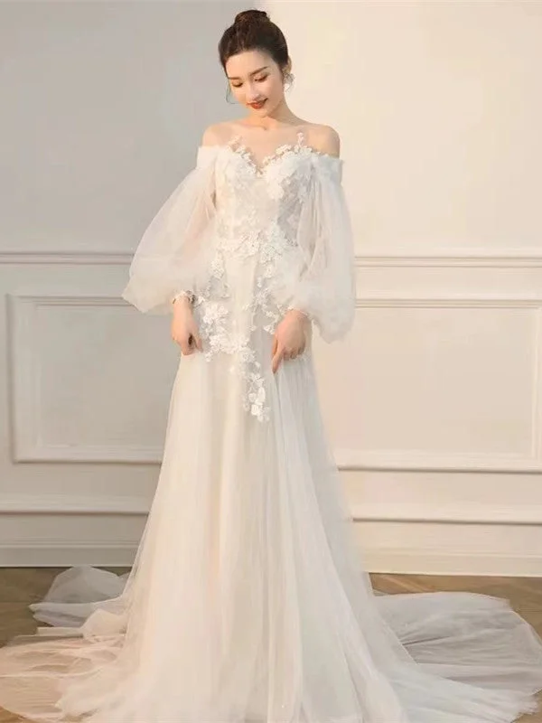 Fit - and - flare wedding dress with a big bowA-line Popular Wedding Gowns, Long Sleeves Lace Bridal Gowns, Newest Wedding Dresses