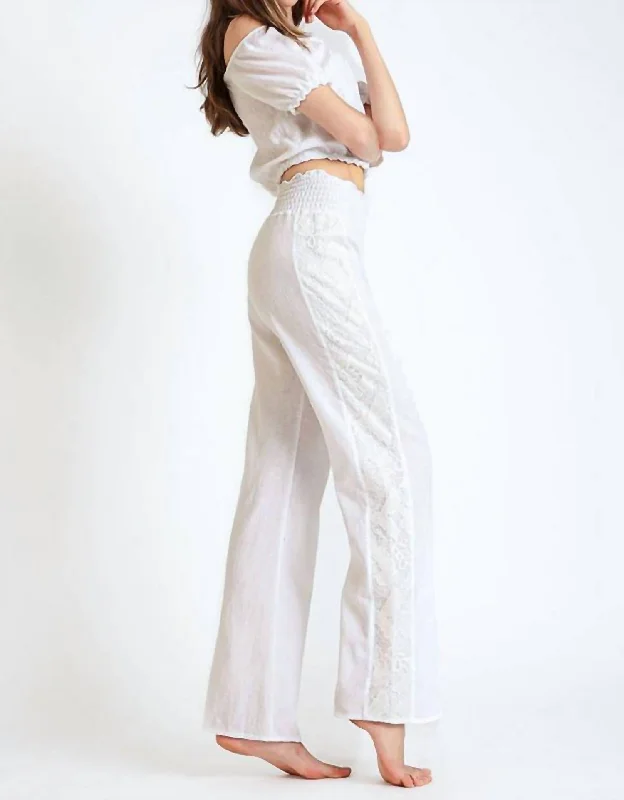 Striped cigarette pants for women in a modern and sleek lookAkira Pant In White