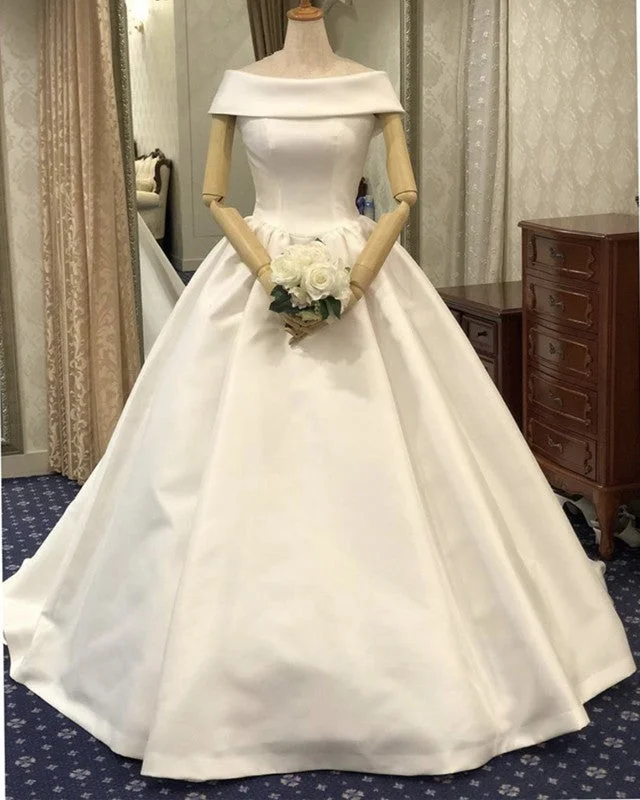 Wedding Dresses with Sheer Sleeve and Sequined Cuffs and Embroidered Bodice and Bow at the Waist for an Elegant and Sparkly LookBall Gown Satin Wedding Dress Off The Shoulder Wedding Dresses with Sheer Sleeve and Sequined Cuffs and Embroidered Bodice and Bow at the Waist for an Elegant and Sparkly LookBall Gown Satin Wedding Dress Off The Shoulder