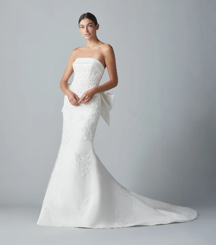 Wedding Dresses with Sheer Sleeve and Sequined Cuffs and Embroidered Bodice and Bow at the Waist for an Elegant and Sparkly LookAllison Webb Essex - Size 2/4/6 Wedding Dresses with Sheer Sleeve and Sequined Cuffs and Embroidered Bodice and Bow at the Waist for an Elegant and Sparkly LookAllison Webb Essex - Size 2/4/6