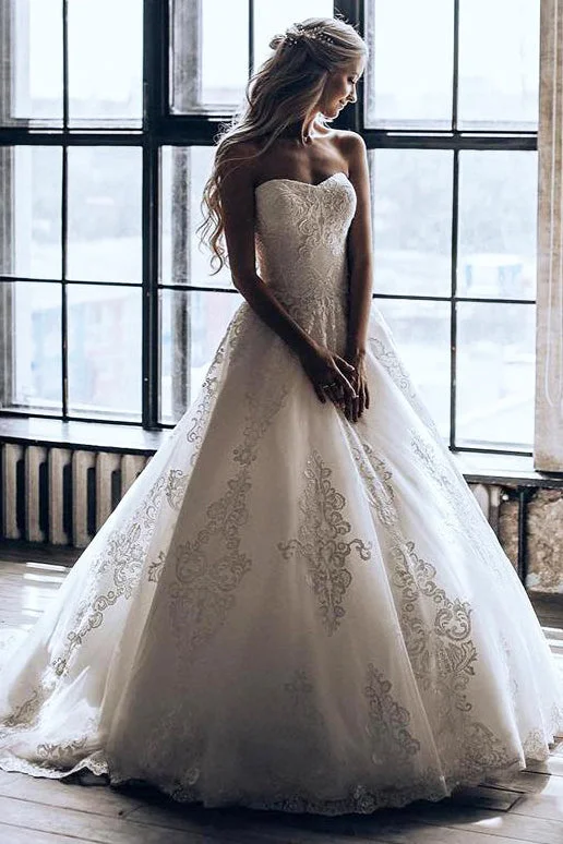 Wedding Dresses with Sheer Panels and Sequined Trim and Belt for a Sultry and Sparkly LookLong Strapless A-line Ivory Wedding Dress with Appliques Wedding Dresses with Sheer Panels and Sequined Trim and Belt for a Sultry and Sparkly LookLong Strapless A-line Ivory Wedding Dress with Appliques