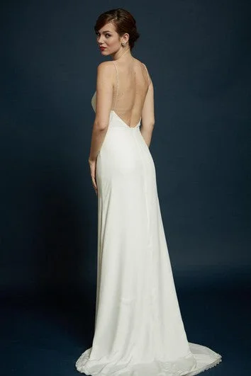 Wedding Dresses with Ruffled Hem and Bow at the Waist and Satin Ribbon and Embroidered Floral Patterns for a Sweet and Feminine LookCharmeuse Sheath Sleeveless Dress With Spaghetti Straps and Open Back Wedding Dresses with Ruffled Hem and Bow at the Waist and Satin Ribbon and Embroidered Floral Patterns for a Sweet and Feminine LookCharmeuse Sheath Sleeveless Dress With Spaghetti Straps and Open Back