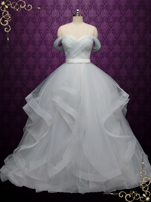 Wedding Dresses with Metallic Sequined Bodice and Chiffon Skirt and Ruffled Hem and Sheer Back for a Glamorous and Flirty LookDove Gray Wedding Dress with Off the Shoulder Neckline ESME Wedding Dresses with Metallic Sequined Bodice and Chiffon Skirt and Ruffled Hem and Sheer Back for a Glamorous and Flirty LookDove Gray Wedding Dress with Off the Shoulder Neckline ESME