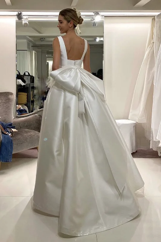Wedding Dresses with Asymmetric Hem and Sequined Details for a Unique StyleMinimalist Satin Wedding Gown with Boat Neckline Wedding Dresses with Asymmetric Hem and Sequined Details for a Unique StyleMinimalist Satin Wedding Gown with Boat Neckline