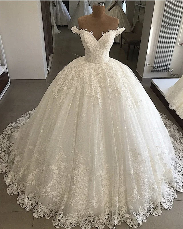 Wedding Dresses with Lace Insertions on the Skirt and Beaded Waistband and Ruffled Hem and Bow at the Waist for a Feminine and Flirty LookPearl Beaded Lace V-neck Tulle Wedding Dresses Ball Gown Off Shoulder Wedding Dresses with Lace Insertions on the Skirt and Beaded Waistband and Ruffled Hem and Bow at the Waist for a Feminine and Flirty LookPearl Beaded Lace V-neck Tulle Wedding Dresses Ball Gown Off Shoulder
