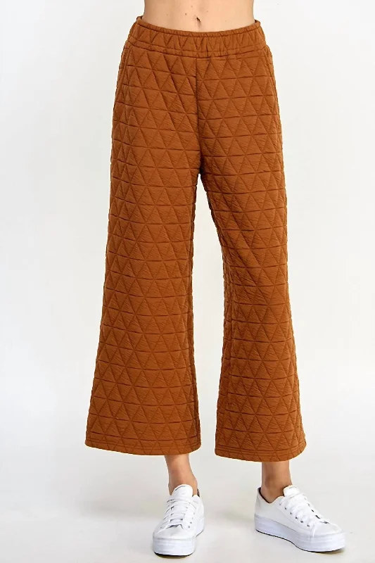Pleated pants for women with a formal touchQuilted Luxe Pants In Rust