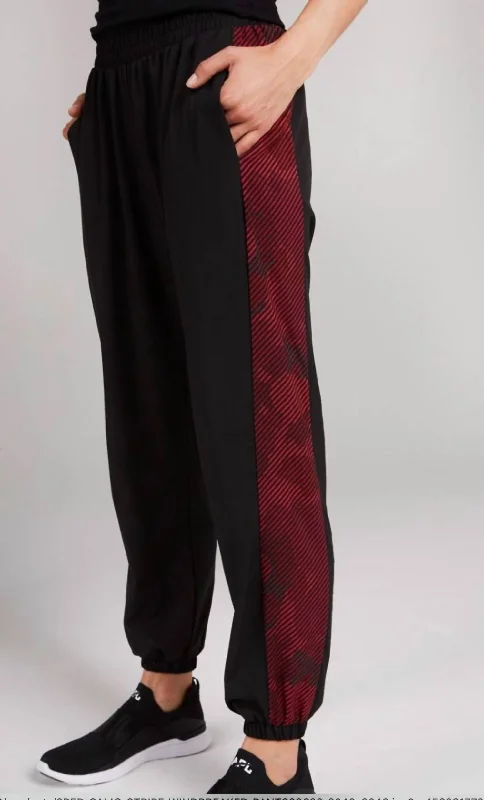 Elastic waist skinny pants for plus size women in a comfortable fitRed Camo Stripe Windbreaker Jogger In Red Camo Stripe Seamless