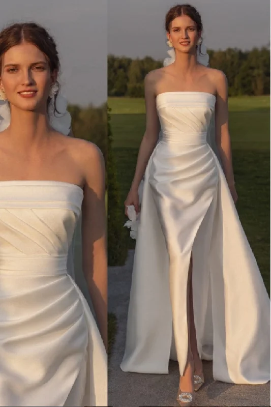 Wedding Dresses with Ruffled Hem and Bow at the Waist and Satin Ribbon and Embroidered Floral Patterns for a Sweet and Feminine LookRuched Strapless Satin Bride Dress with Split Skirt Wedding Dresses with Ruffled Hem and Bow at the Waist and Satin Ribbon and Embroidered Floral Patterns for a Sweet and Feminine LookRuched Strapless Satin Bride Dress with Split Skirt