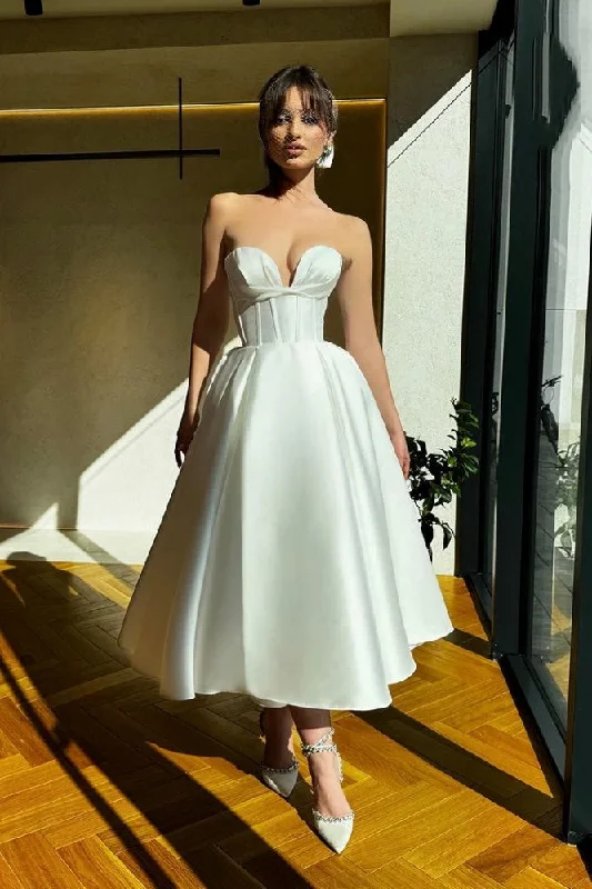 Wedding Dresses with Embroidered Tribal Patterns and Satin Sash and Beaded Waistband and Tulle Skirt for a Cultural and Stylish LookRuched Sweetheart Short Wedding Dress for Reception Wedding Dresses with Embroidered Tribal Patterns and Satin Sash and Beaded Waistband and Tulle Skirt for a Cultural and Stylish LookRuched Sweetheart Short Wedding Dress for Reception