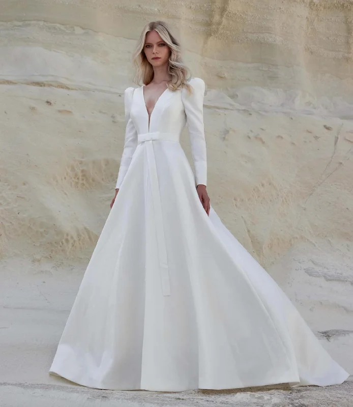 Wedding Dresses with Pleated Tulle Skirt and Sequined Geometric Shapes and Lace Overlay and Bow at the Waist and Embroidered Floral Patterns for a Princess and Feminine LookSassi Holford Tamsin
