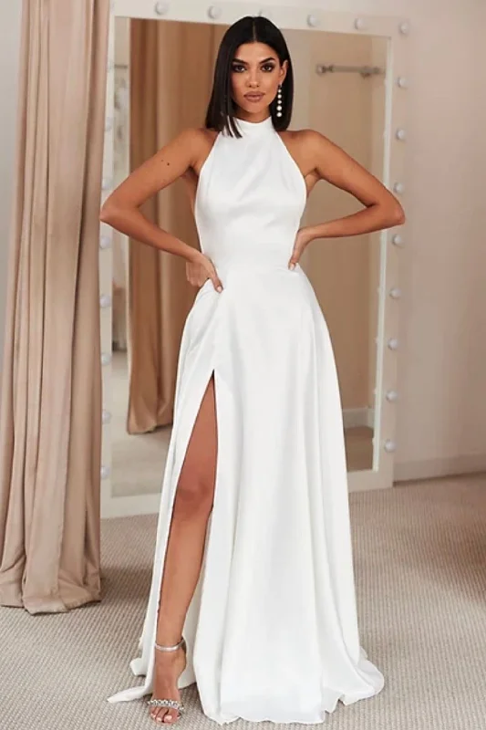 Wedding Dresses with Sheer Panels and Beaded Trim and Bow at the Back and Embroidered Paisley Patterns for a Sexy and Exotic LookSleeveless Split Side Wedding Gown with High Halter Neck Wedding Dresses with Sheer Panels and Beaded Trim and Bow at the Back and Embroidered Paisley Patterns for a Sexy and Exotic LookSleeveless Split Side Wedding Gown with High Halter Neck
