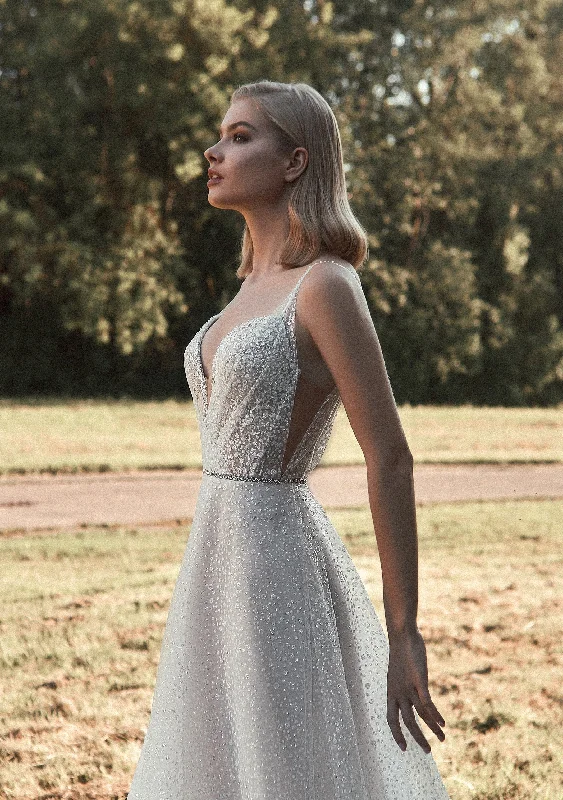 Wedding Dresses with Rhinestone Embellishments and Sheer Sleeves and Tulle Skirt for a Luxurious and Alluring LookSpaghetti Strap Glitter Wedding Gown Wedding Dresses with Rhinestone Embellishments and Sheer Sleeves and Tulle Skirt for a Luxurious and Alluring LookSpaghetti Strap Glitter Wedding Gown