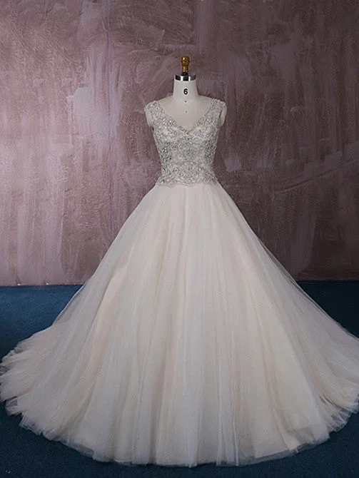 Sheath - style wedding dress with a slitStunning Tulle Ball Gown Wedding Dress with Jeweled Embroideries | QT815006