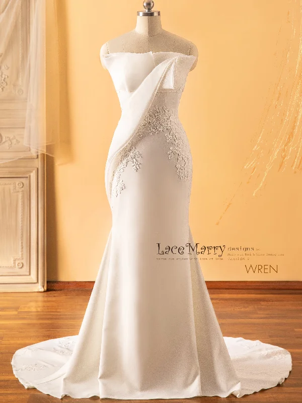 Wedding Dresses with Satin and Lace Trimmed Neckline and Ruffled Sleeves and Embroidered Skirt and Bow at the Back and Belt for a Sophisticated and Girly LookWREN / Elegant Wedding Dress with Romantic Neckline Wedding Dresses with Satin and Lace Trimmed Neckline and Ruffled Sleeves and Embroidered Skirt and Bow at the Back and Belt for a Sophisticated and Girly LookWREN / Elegant Wedding Dress with Romantic Neckline