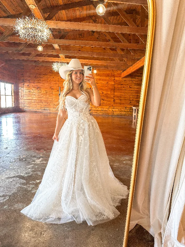 Wedding Dresses with Satin Trimmed Collar and Ruffled Hem and Bow at the Waist for a Classic and Girly LookWrenley Wedding Dress Wedding Dresses with Satin Trimmed Collar and Ruffled Hem and Bow at the Waist for a Classic and Girly LookWrenley Wedding Dress