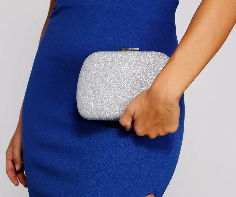 "Denim dresses for women for a casual and cool style"Show Stopper Glitter Box Clutch