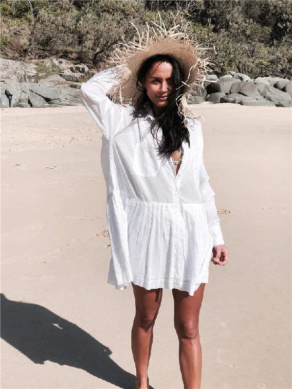 layered mini dressesDodie Cotton Pocketed Puff Sleeve Babydoll Dress - White